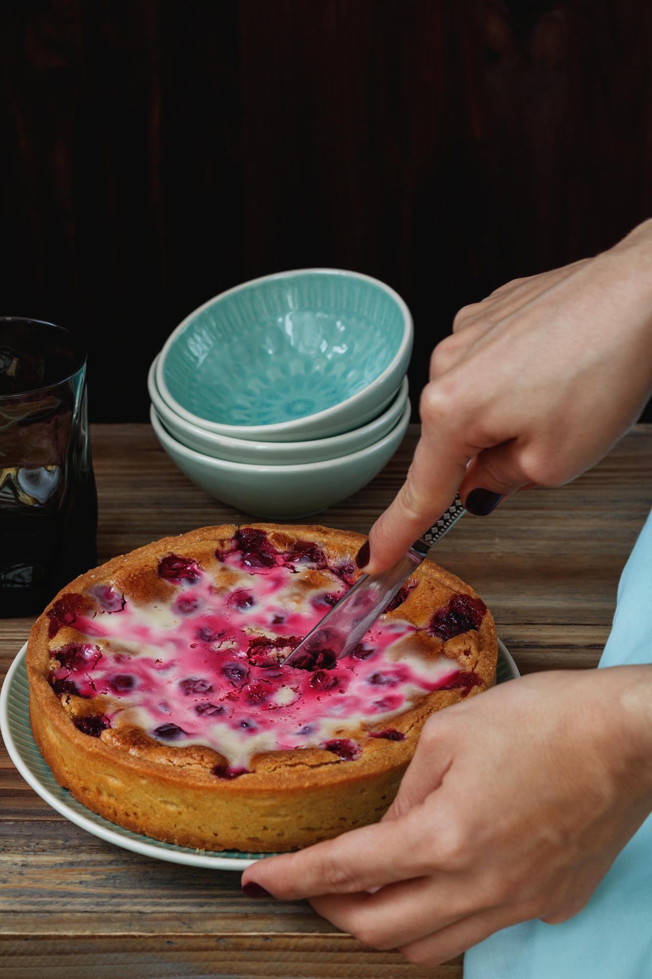 hands glazing tart with warm mirror finish