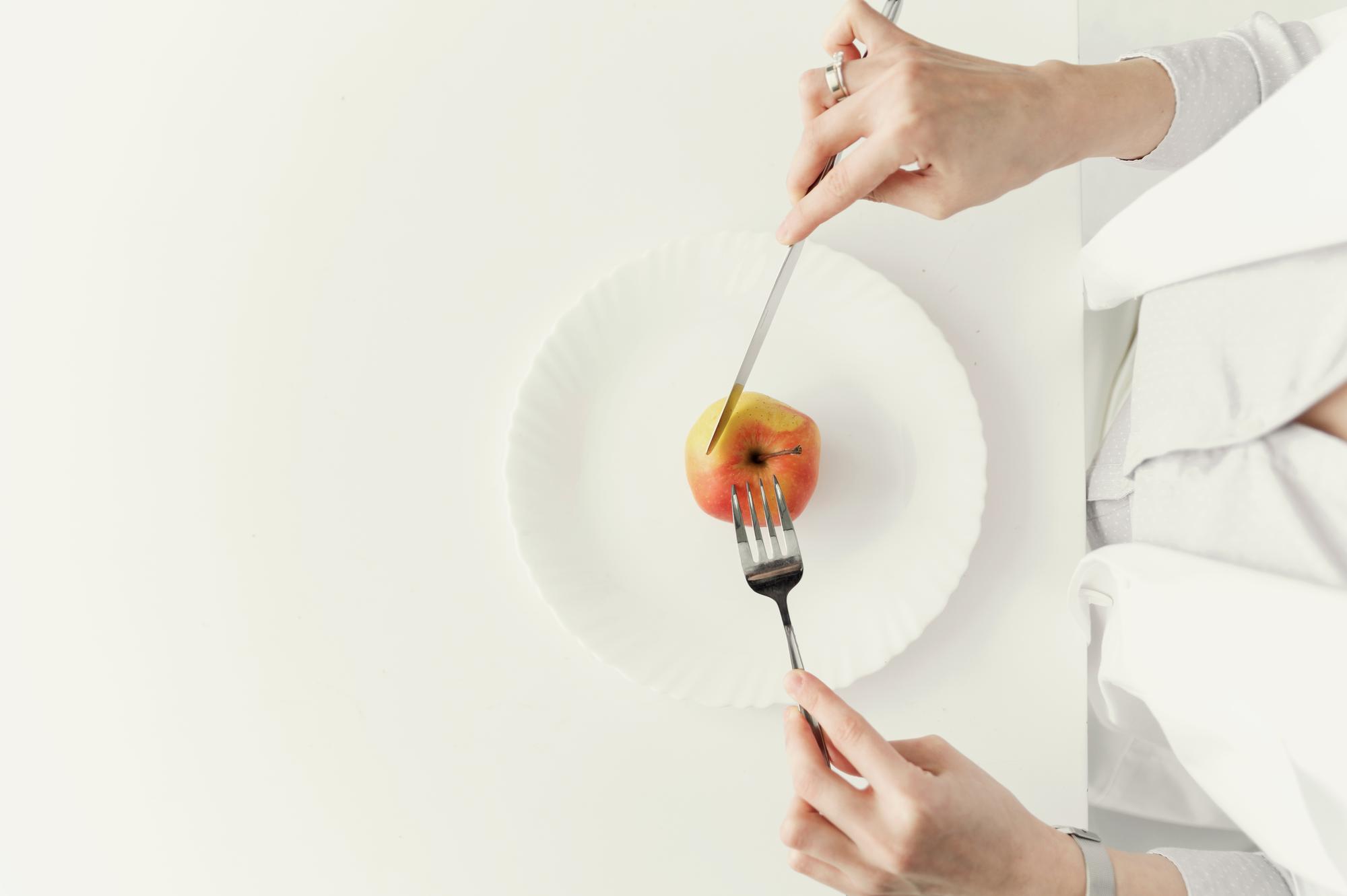 small team plating a tasting menu in studio